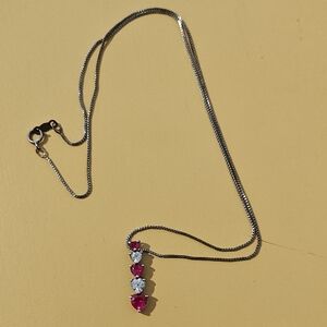 Elegant Silver and Red Heart Pendant Necklace